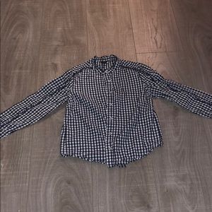I am selling a black and white button down